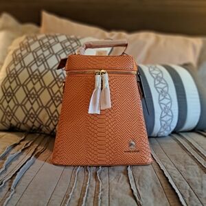 Tote & Carry Orange Cowbell Backpack
